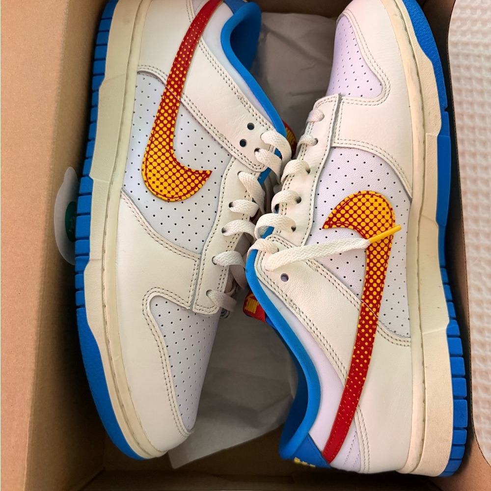 Nike White Sneakers with Red and Blue Accents